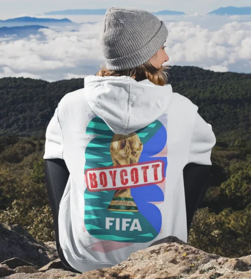 model wearing white Boycott Fifa Hoodie
